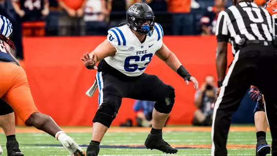 Duke offensive lineman Bradley Smith stands and reacts after a snap during the Blue Devils' 38-3 victory at Syracuse on September 27, 2025.