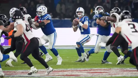 Former Duke quarterback Daniel Jones drops back to throw a pass in the NFL Berlin Game against the Atlanta Falcons.