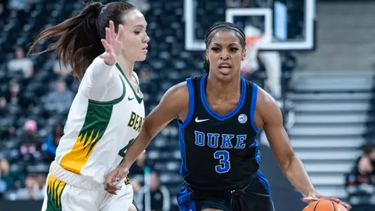 Ashlon Jackson drives with her left hand against Baylor in Adidas Arena in Paris