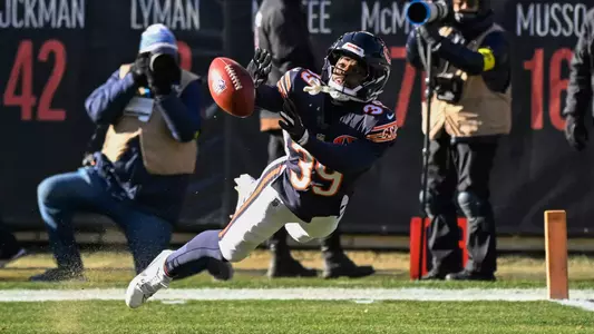 Former Duke cornerback Josh Blackwell dives and helps down a punt at the one-yard line for the NFL's Chicago Bears against the Cleveland Browns.