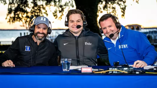 Duke Football Radio Show co hosts Manny Diaz, Dave Harding and David Shumate pose for a photo outside during the TaxSlayer Gator Bowl show.
