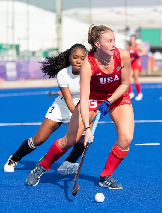 Madison Beach controls the ball for Team USA while being defended by an opponent at the 2025 Junior Pan American Games.