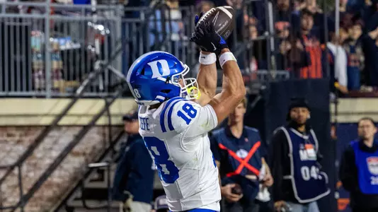 Duke freshman wide receiver Brody Keefe, wearing a blue helmet and white jersey, catches the game-winning touchdown pass at Virginia to push to a 19-16 victory on October 23, 2026.