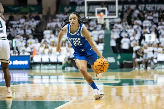 Duke guard Taina Mair dribbles the ball upcourt in a blue uniform during a game against South Florida.
