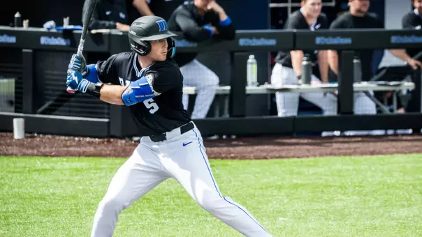 Matthew Strand bats against Miami