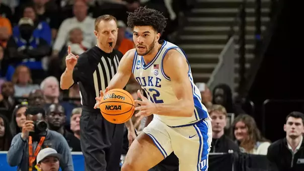 Duke's Cameron Boozer grabs a loose ball during the Blue Devils' victory against TCU in the second round of the NCAA Tournament on March 21, 2026.