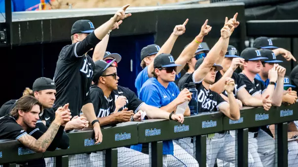 Duke baseball dugout celebrates
