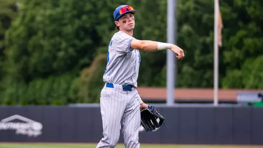 Collin Anderson throws the ball for Duke baseball