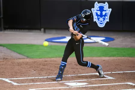 Aminah Vega makes contact at the plate