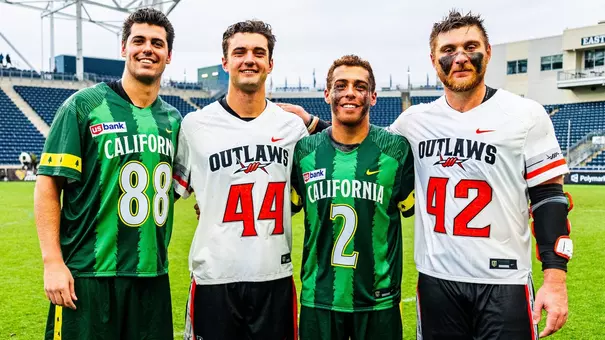 Aidan Danenza, Jack Gray, Andrew McAdorey and Brennan O'Neill take a picture together following a PLL game