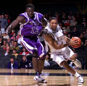 Vanderbilt's Aubrey Hammond drives to the basket against Femi Ibikunle. (AP Photo/The Tennessean, Michael Clancy)