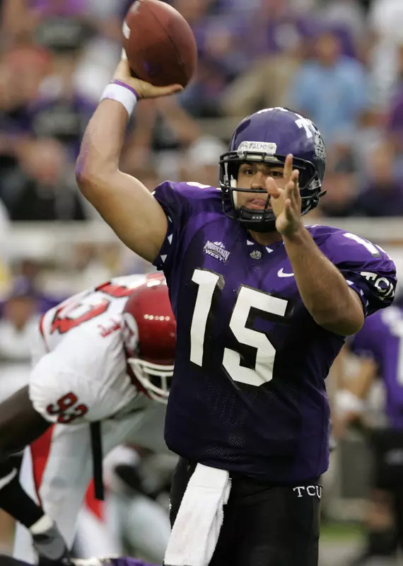 Tye Gunn throws the ball under pressure from Utah defensive end Martail Burnett during the first quarter.