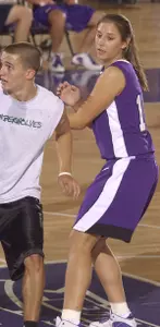 Emily Carter guards a member of the Frog Squad