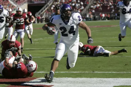 Joseph Turner (24) scores against Stanford in the second quarter. (AP Photo/Paul Sakuma)