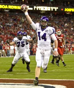 TCU quarterback Andy Dalton scores on a three yard bootleg during the second quarter of the Texas Bowl. (AP Photo/Bob Levey)