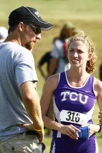 Distance coach Shawn Winget gives directions at UNT.