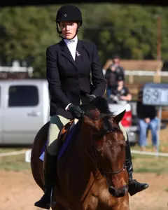 Milana Trimino scored a point for TCU in equitation on the flat