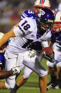 Ryan Christian fights off SMU players in Saturday's game.