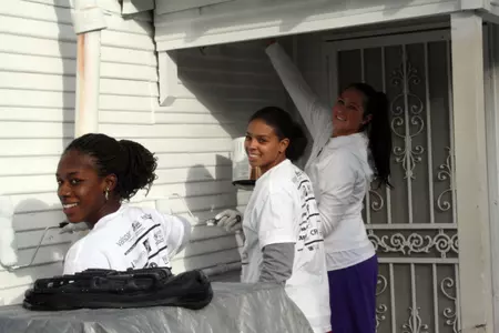 The TCU women's basketball team volunteered a recent Saturday to help paint homes in the Fort Worth area.