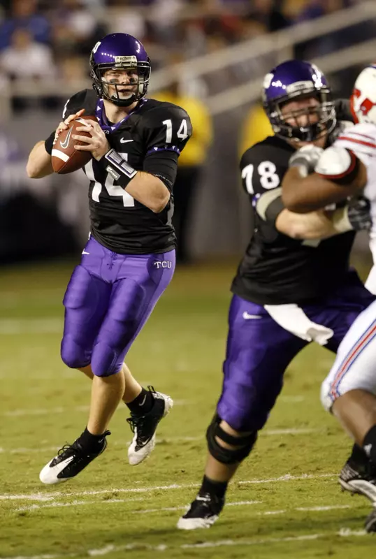 TCU quarterback Andy Dalton (14) looks for an open receiver against SMU. (AP)
