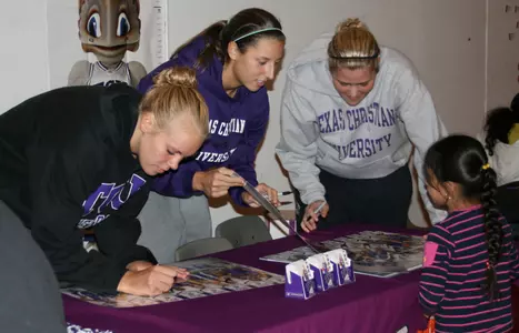 Emily Carter and Micah Garoutte visited the the Arlington Girls Inc. last week for a Halloween event with local youth.