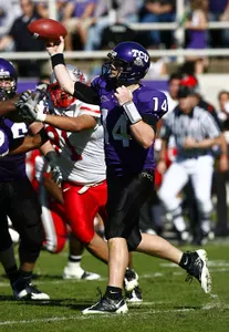TCU quarterback Andy Dalyon throws to an open receiver in the first half.
