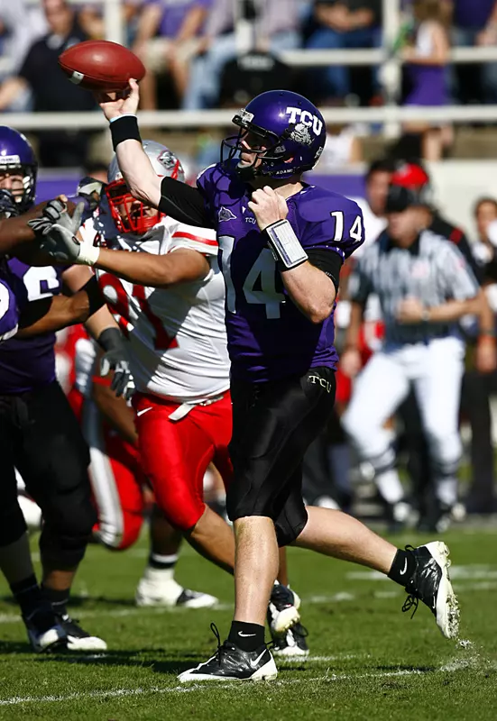 TCU quarterback Andy Dalyon throws to an open receiver in the first half.