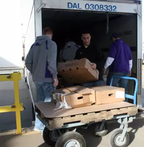 Curtis Clay was one of four TCU football players to help with Thursday's donation to Tarrant Area Food Bank.