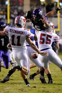 Tanner Brock attempting to block a punt in TCU's 39-14 victory over SMU.