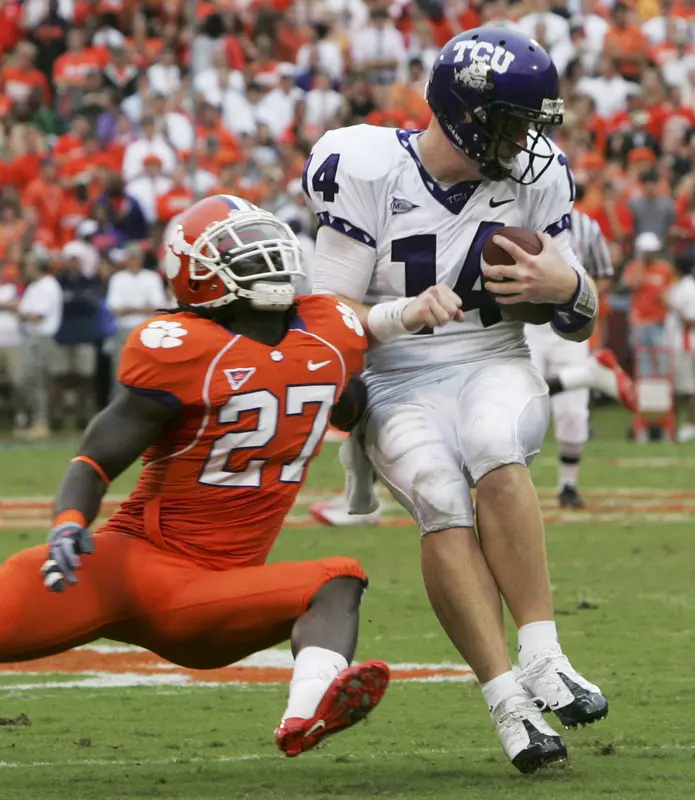 Andy Dalton scrambles past Clemson's Sadat Chambers
