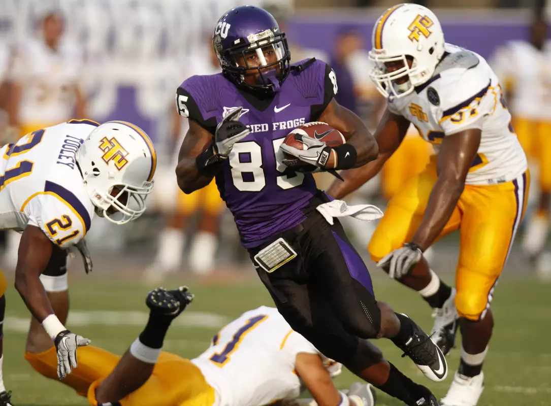 TCU reciever Jeremy Kerley runs for yardage after a catch in the first half.