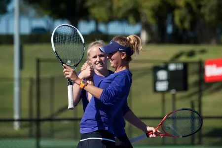 Olivia Smith (left) and Millie Nichols are the USTA/ITA Texas Regional doubles champions.