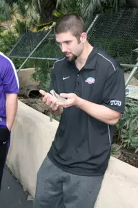 Tank Carder holds a horned lizard.