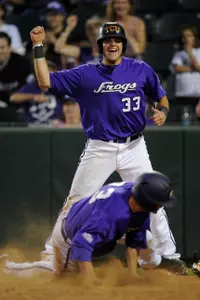 Joe Weik celebrates Zac Jordan scoring in the sixth inning.