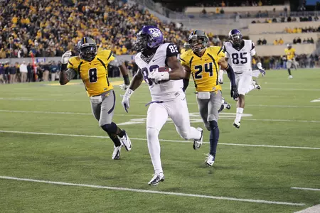 Josh Boyce racing to the end zone with his 94-yard touchdown catch to force overtime with 1:28 to play in the fourth quarter at West Virginia.