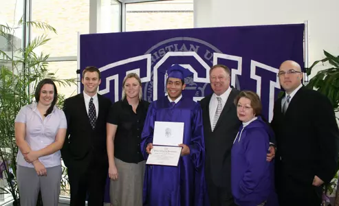 Edgar Crespo with his diploma