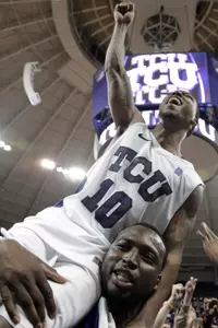 Hank Thorns, 32 points, is carried off the court after TCU upset No. 11 UNLV for first victory over ranked opponent at home since 2007.