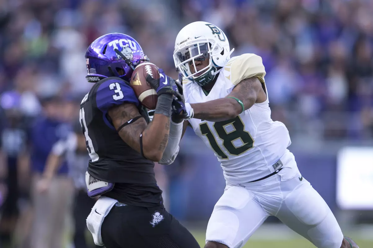 Brandon Carter catches a pass in front of Baylor cornerback Xavien Howard.