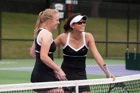 Olivia Smith (left) and Stefanie Tan defeated the No. 13 doubles team in the country Sunday