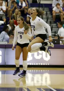 Sutton Sunstrum and Alexia Heist celebrate a point against North Texas Wednesday night.