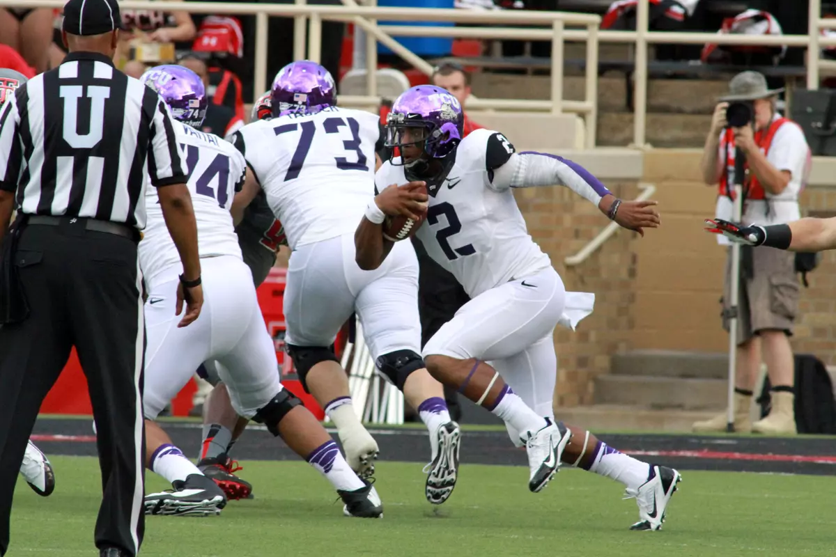Quarterback Trevone Boykin (2) rushes against the Red Raiders. Mandatory Credit: Michael C. Johnson-USA TODAY Sports