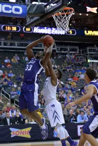 Chris Washburn (33) shoots a layup as Kansas State Wildcats.