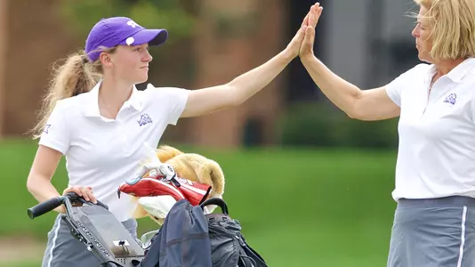 Greta Bruner (left) and TCU head coach Angie Ravaioli-Larkin