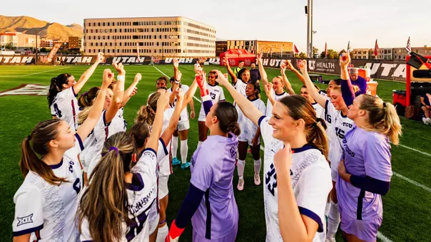 TCU women's soccer team huddle