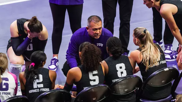 Jason Williams coaches the Frogs on the bench