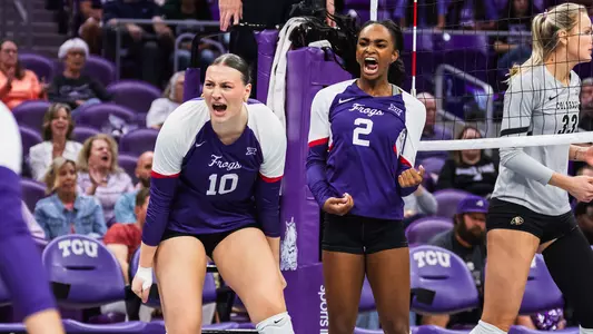 Kinsley Young and Evan Hendrix celebrate after a block against Colorado