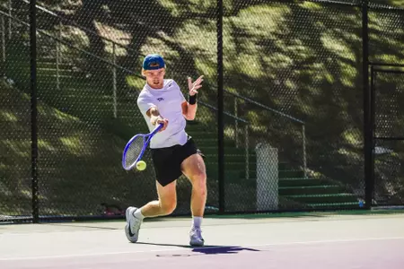 Albert is about to make contact with the ball on his forehand