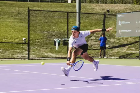 Albert Pedrico approaching the net about to get under a drop shot