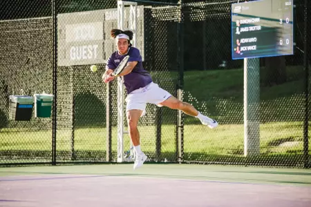 Duncan Chan ripping a jumping two handed backhand