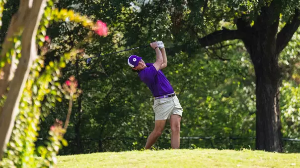 Cameron Kuchar swings through after teeing off.